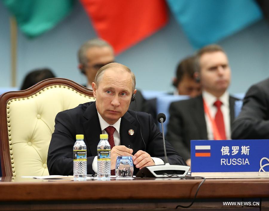 Russian President Vladimir Putin attends the fourth summit of the Conference on Interaction and Confidence Building Measures in Asia (CICA) in Shanghai, east China, May 21, 2014. (Xinhua/Pang Xinglei)
