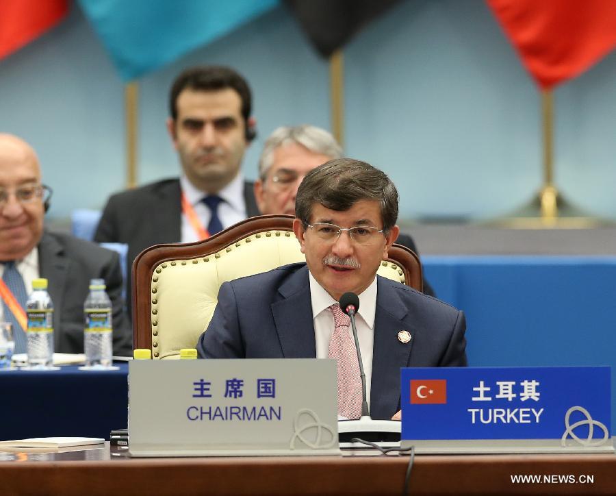 Turkish Foreign Minister Ahmet Davutoglu speaks during the fourth summit of the Conference on Interaction and Confidence Building Measures in Asia (CICA) in Shanghai, east China, May 21, 2014. (Xinhua/Pang Xinglei) 