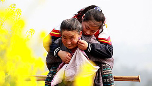 Photo story: Going to school on grandma's back