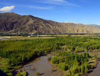 Beautiful riverside view of Lhasa.          Green, the most vivid color of Lhasa     The spacious streets, being expanded and extended every now and then, have amplified the urban structure.               Drive towards a new era along well-connected roads     The first expressway – Lhasa-Minya Konka Airport Expressway – was put into use in July 2011. It put an end to the history in which Tibet had no expressway at all.     Protecting Electrical Safety in Lhasa's Barkhor Street-centric Old ZoneLhasa bids a farewell to chilly winterThe blessed metamorphosis of the sole fishing village in Tibet