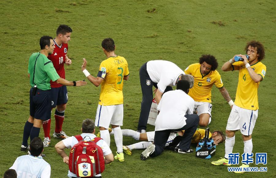 Brazil have suffered a huge setback as team doctor Rodrigo Lasmar confirmed star man Neymar suffered a broken vertebra and is out of the World Cup after he was stretchered off during the quarterfinal defeat of Colombia. (Photo/Xinhua)