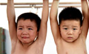 Children attend gymnastics training in summer