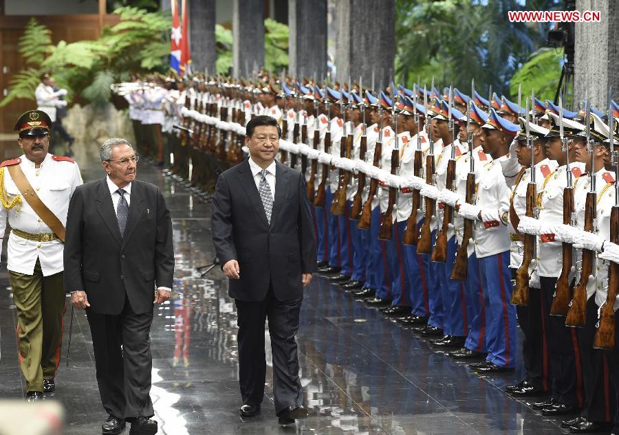 Chinese President Xi Jinping (C) attends a welcoming ceremony held by Cuban President Raul Castro (1st L Front) in Havana, capital of Cuba, July 22, 2014. (Xinhua/Ma Zhancheng)