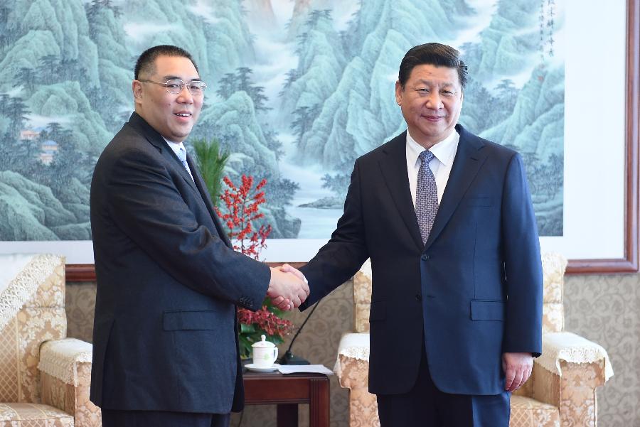 Chinese President Xi Jinping (R) meets with Chui Sai On, chief executive of the Macao Special Administrative Region, in Macao, south China, Dec. 19, 2014. (Xinhua/Wang Ye)