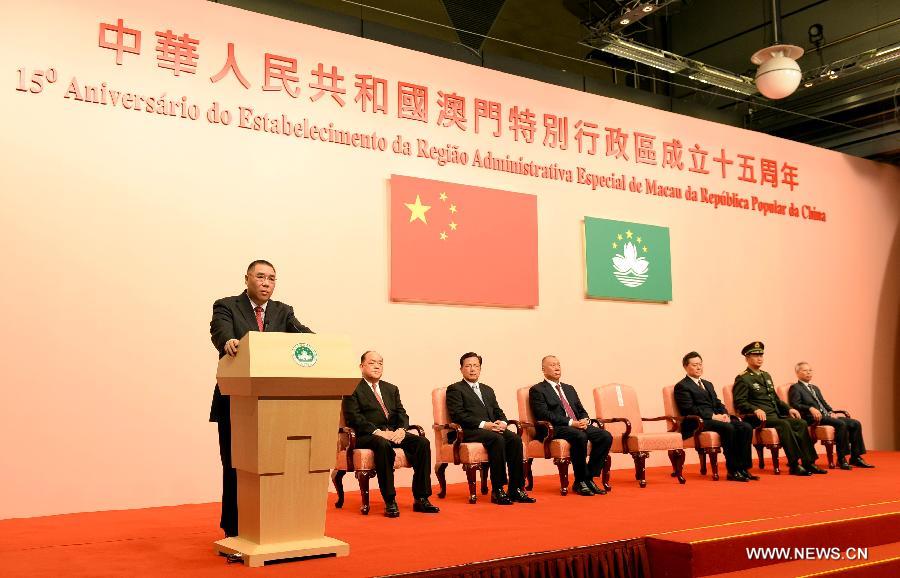 The Macao Special Administrative Region's chief executive Chui Sai On speaks at a cocktail reception held to celebrate the 15th anniversary of Macao's return to China, in Macao, south China, Dec. 20, 2014. (Xinhua/Qin Qing)