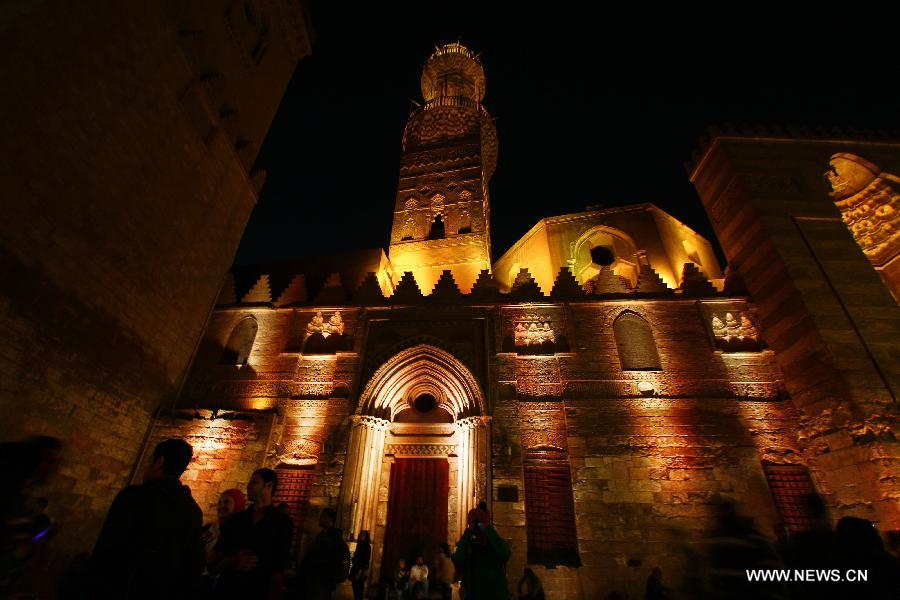 Egyptians visit the Al-Moez Street, which is one of the oldest streets in Cairo, as celebrating the World Heritage Day, in Egypt, on April 18, 2015. (Xinhua/Ahmed Gomaa)