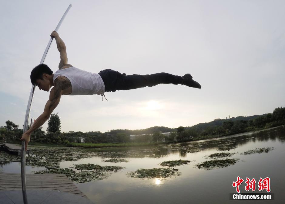 Chinese man from Chengdu loves to pole dance in a revealing sports bra