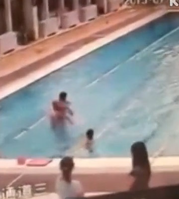 Angry foreigner throws little girl into swimming pool