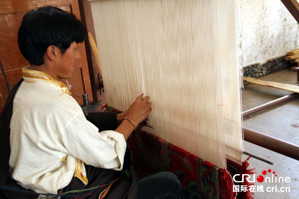 Legend on fingertip: the birth of a Tibetan carpet