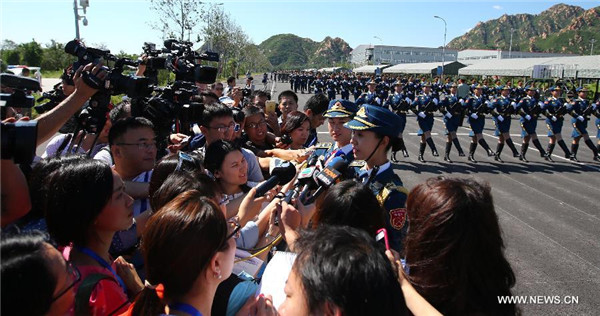 Foreign reporters invited to training base of China's military parade