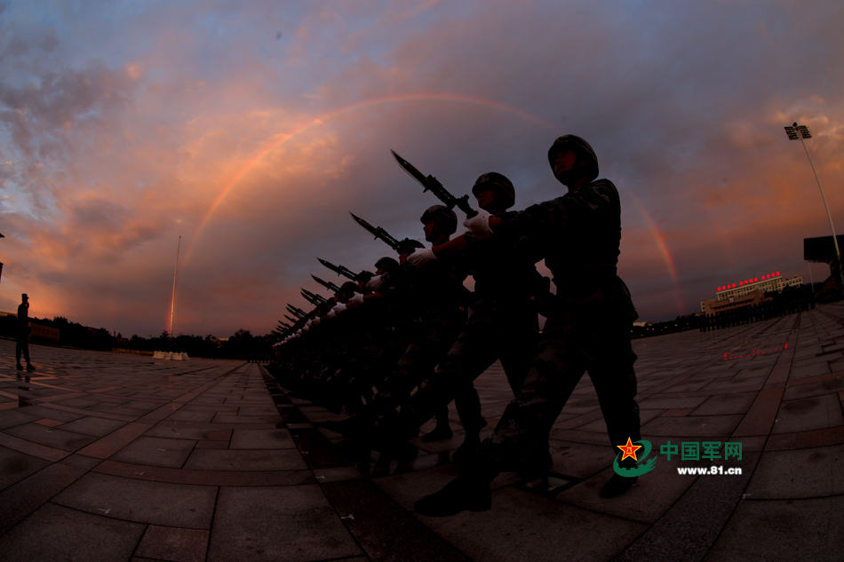 Chinese soldiers conduct training at night for V-Day parade