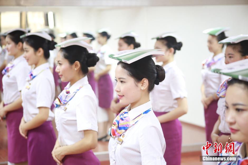 Stewardesses of high-speed train receive training in SW China