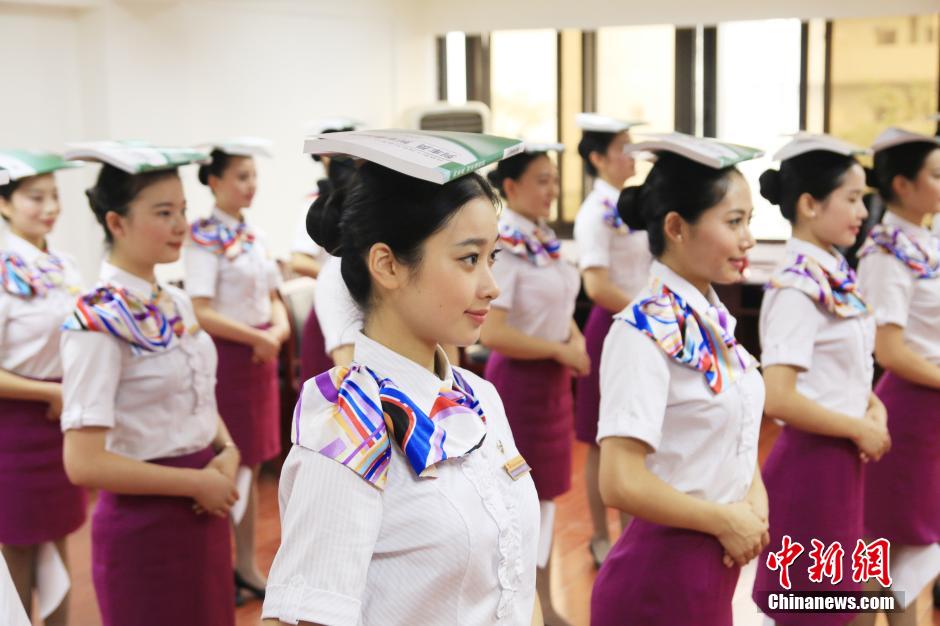 Stewardesses of high-speed train receive training in SW China