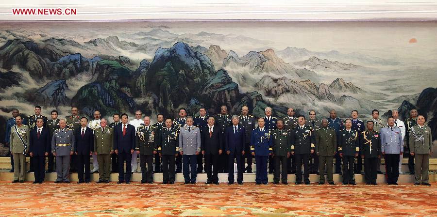 President Xi takes group photo with representatives of foreign armies