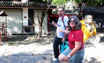 Wife of American historian revisiting Jinan with their autistic son