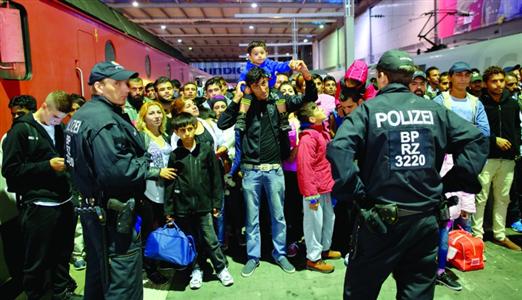 Germany presents first overall plan to handle refugee influx