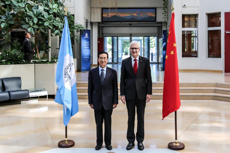 China, Interpol to further strengthen cooperation in hunting fugitives: officials
