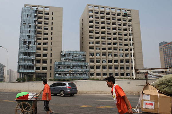 Damaged homes in Tianjin to be bought back at 1.3 times