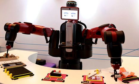 Robots sparkle at Summer Davos Forum in Dalian