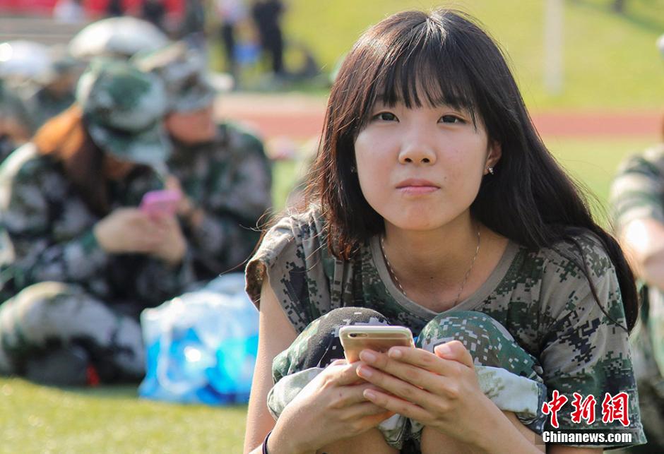 Charming girls attend military training
