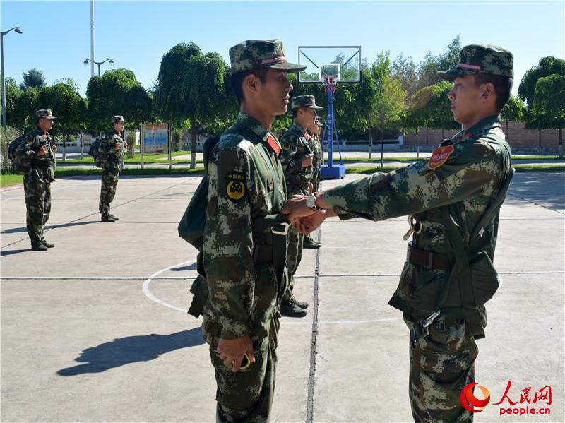 Armed forest police organize downhill training