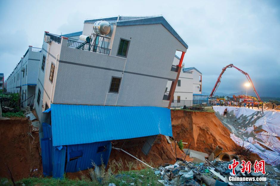 Three-storey building toppled by typhoon Vamco in S China