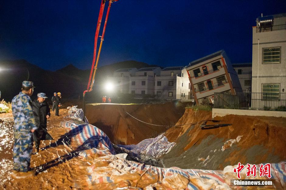 Three-storey building toppled by typhoon Vamco in S China