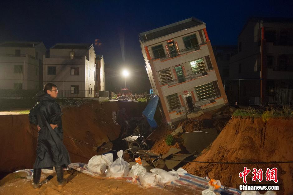 Three-storey building toppled by typhoon Vamco in S China