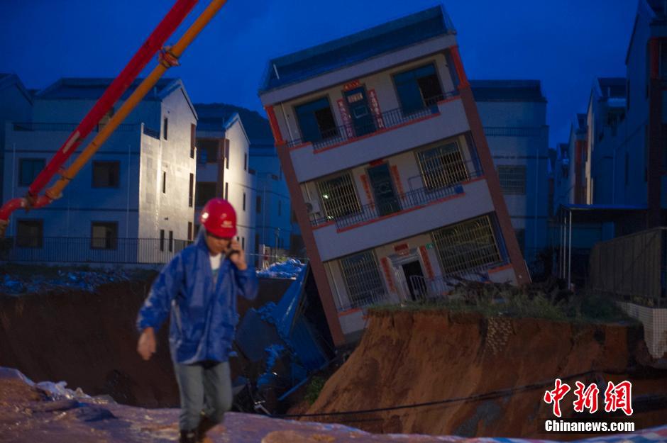 Three-storey building toppled by typhoon Vamco in S China