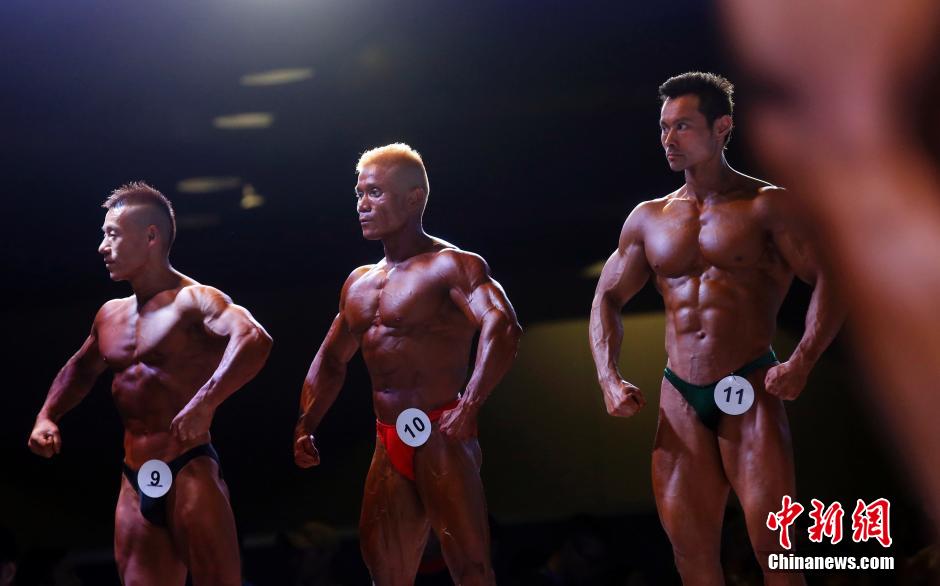Men and women show off perfect figures at FIBO CHINA