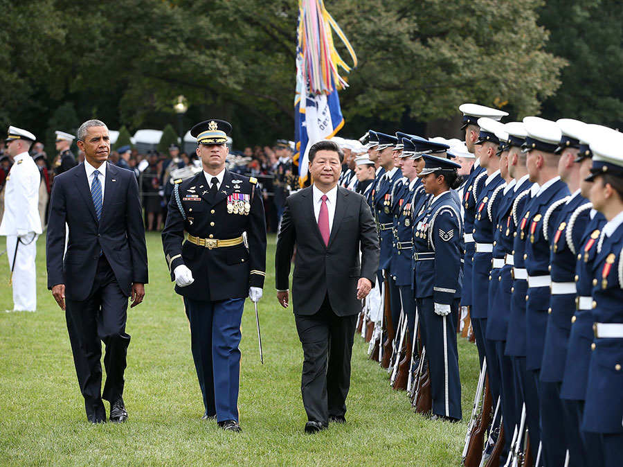 Obama welcomes Xi with 'nihao' at elaborate White House ceremony 