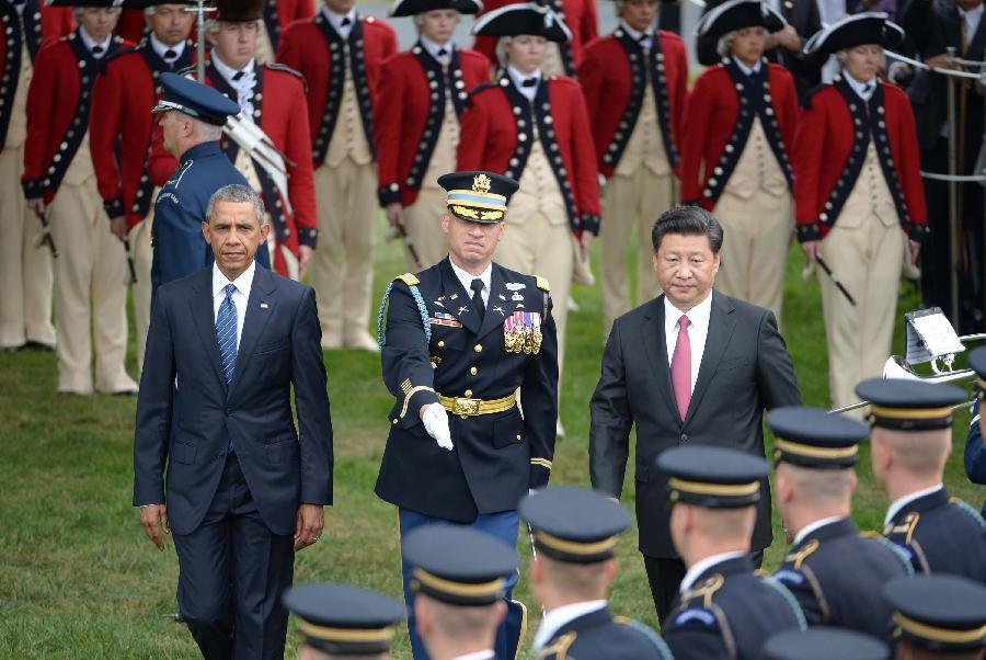 Obama welcomes Xi with 'nihao' at elaborate White House ceremony 