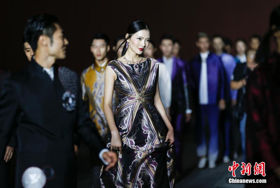 Fashion show staged in Forbidden City at night