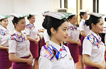 Stewardesses of high-speed train receive training