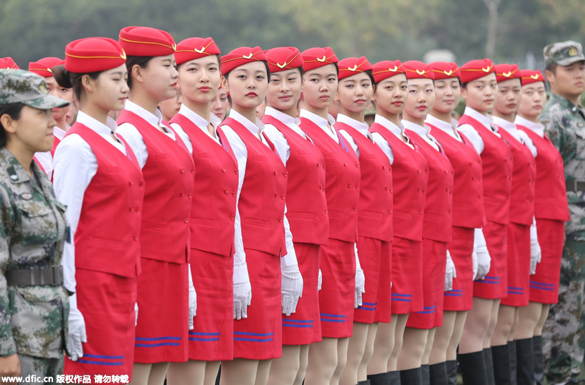 Gorgeous stewardesses-to-be attend military training