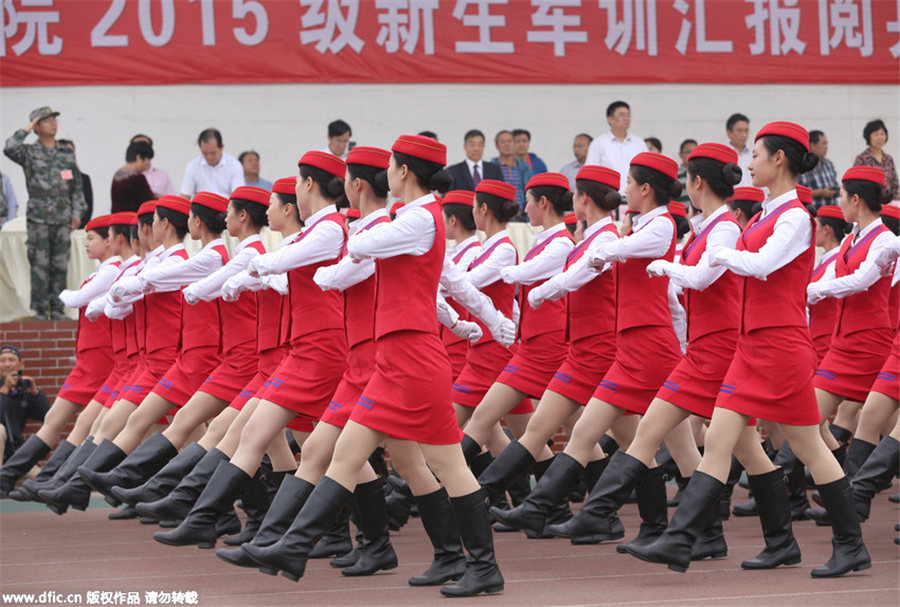 Gorgeous stewardesses-to-be attend military training