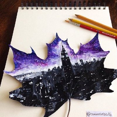 16-yr-old Polish girl uses fallen leaves as canvas