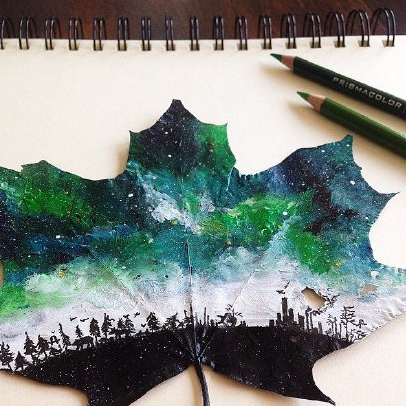 16-yr-old Polish girl uses fallen leaves as canvas