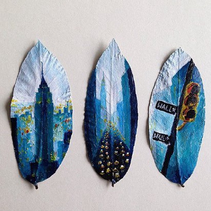 16-yr-old Polish girl uses fallen leaves as canvas