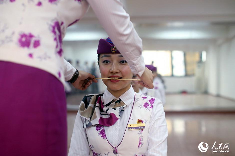 Train stewardesses receive harsh etiquette training 