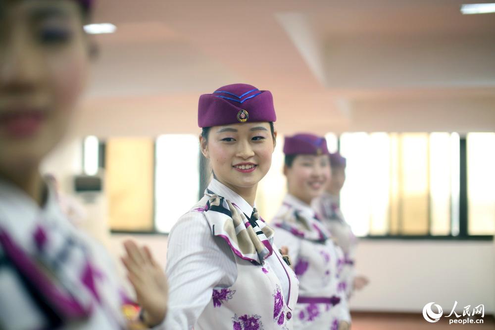 Train stewardesses receive harsh etiquette training 