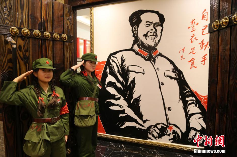 Waiters, waitresses dressed as Red Guards in restaurant in NW China