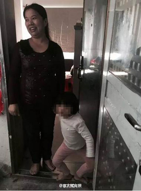 Woman saves baby stuck in window rails on fifth floor
