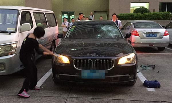 Odd news:Suspecting husband of cheating, wife smashes his BMW car