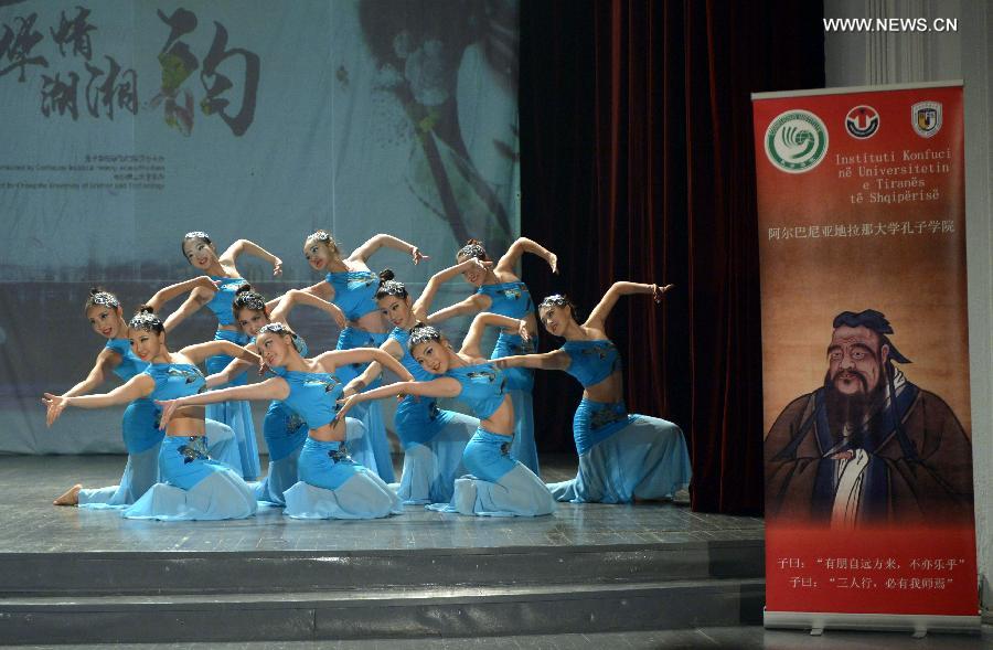 Chinese art troupe members perform gala show in Tirana, Albania