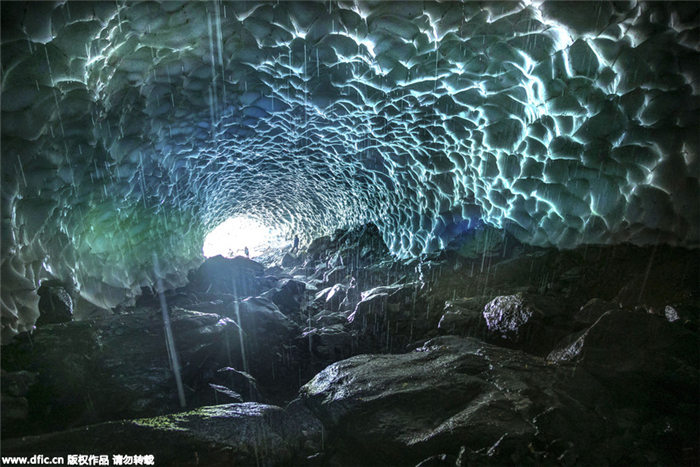 Inside the Georgian Ice Cave with water melting down like rain