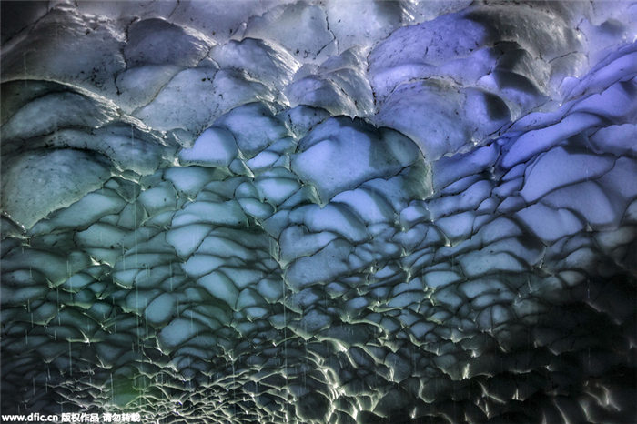 Inside the Georgian Ice Cave with water melting down like rain