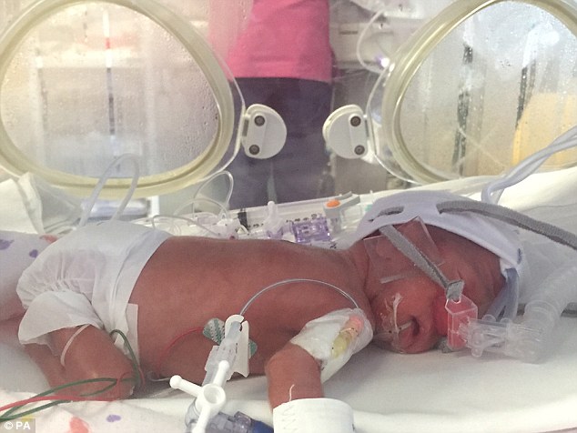 Baby is born four months premature after woman goes into labour on a transatlantic flight