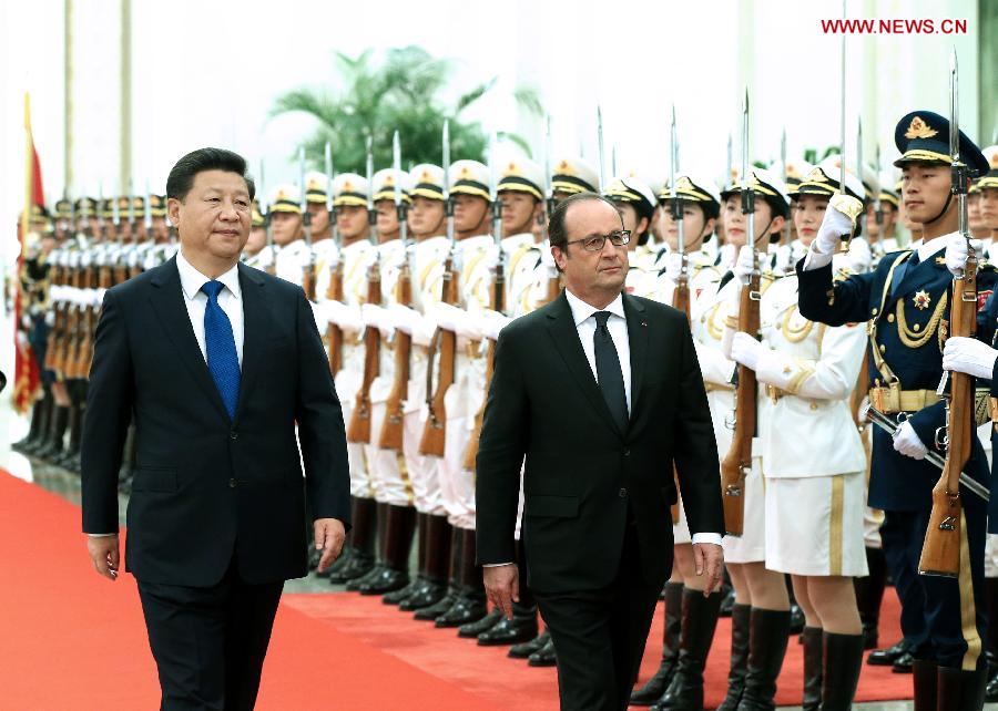 President Xi Meets with French President, Vowing Ties on Nuclear Power, Airplanes