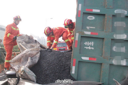 Firefighters save trapped man by excavating scalding bitumen with hands
